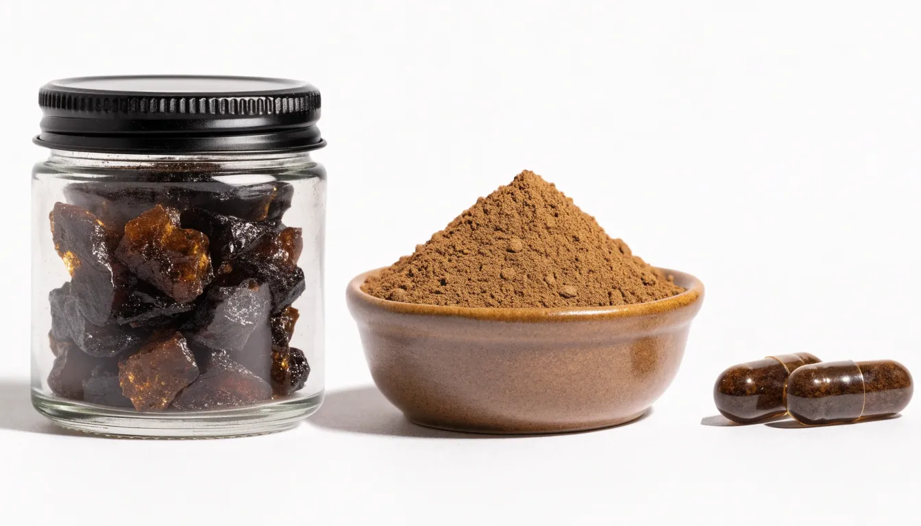Side-by-side comparison of dark shilajit resin jar, brown powder, and oral capsules on a wooden surface.